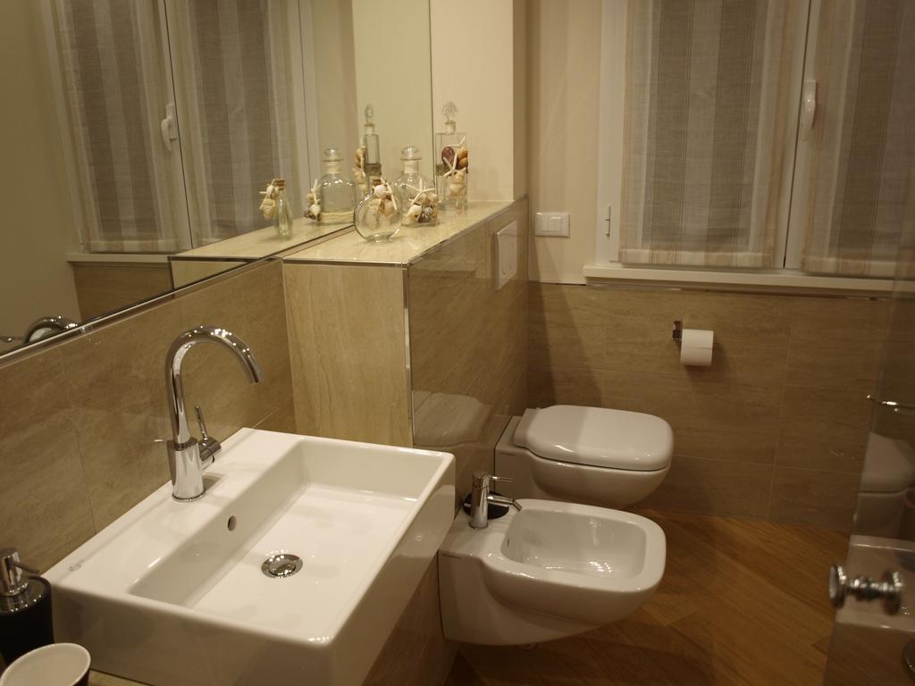 Il Pontile Holidays Apartment Marina di Pietrasanta Cameră foto